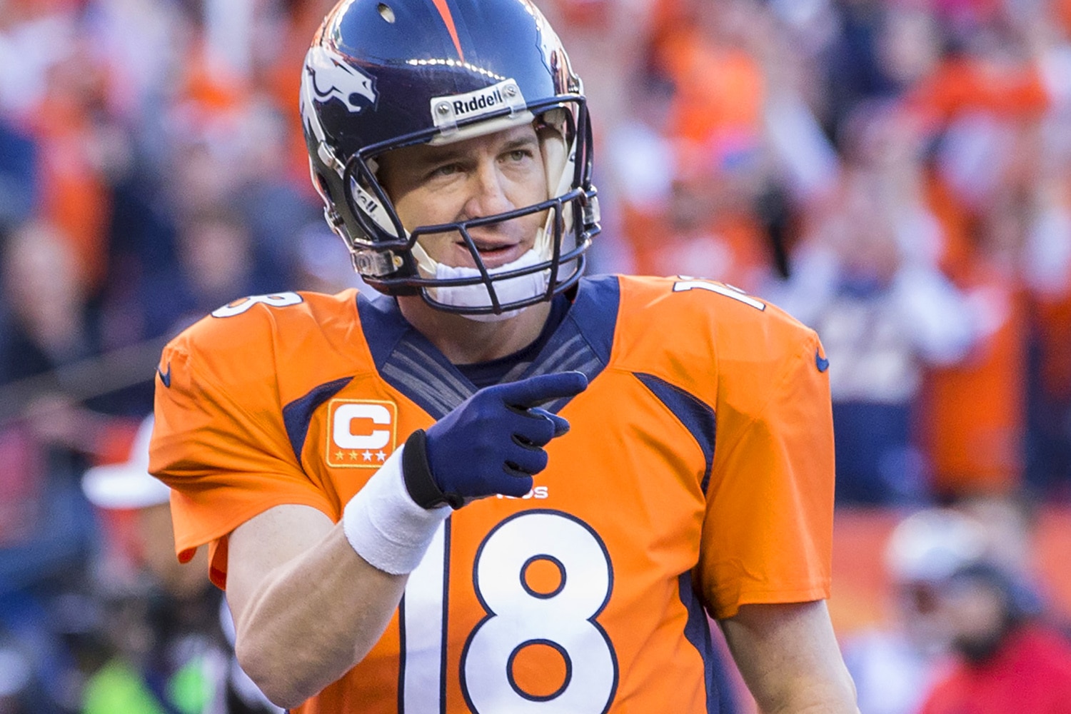 Denver, USA - JANUARY 19: Denver Broncos vs New England Patriots AFC Championship at Sports Authority Field. The Denver Broncos defeat the New England Patriots. Peyton Manning celebrates after the win. (Photo by Anthony J. Causi)