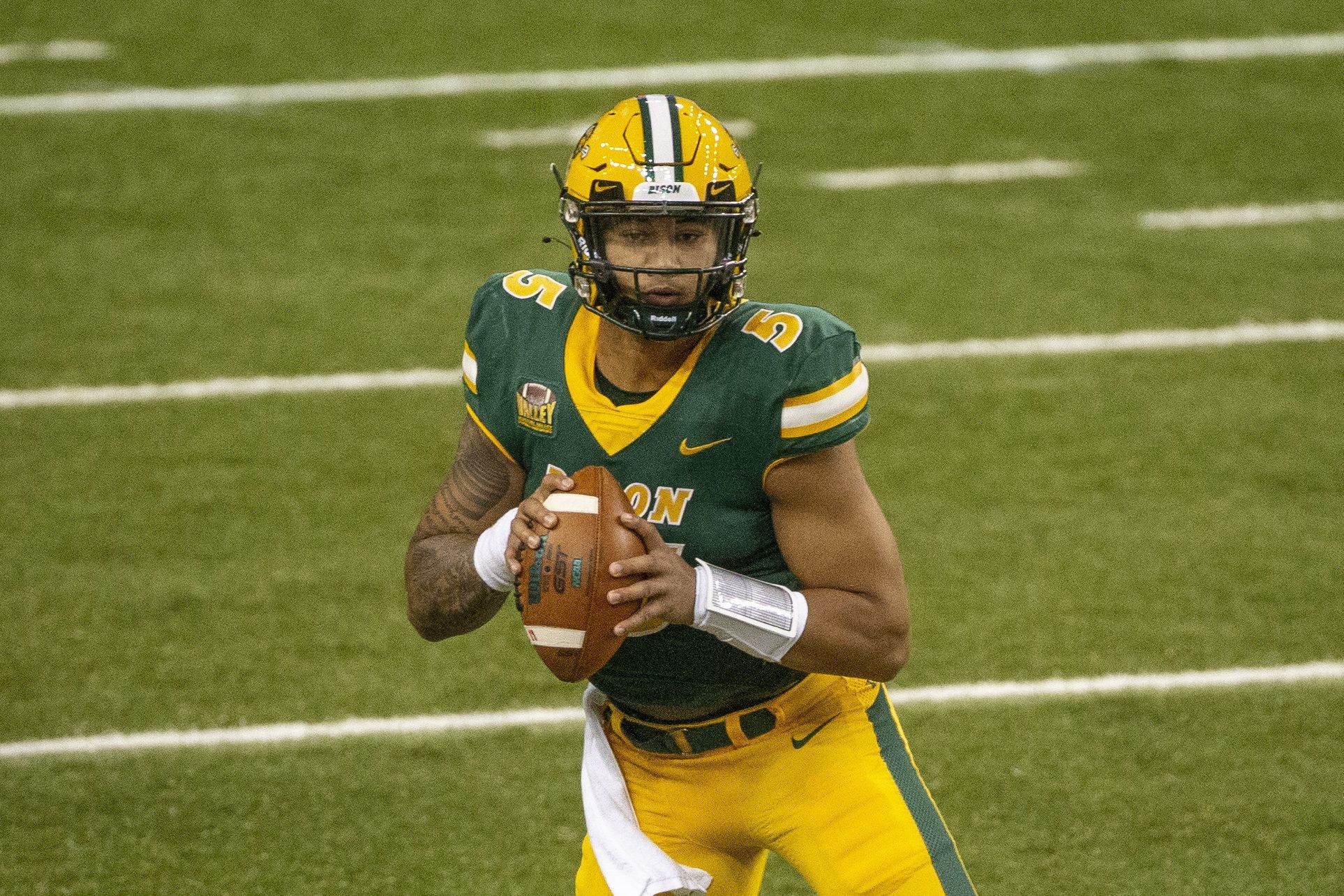 North Dakota State quarterback Trey Lance scrambles against Central Arkansas in the first quarter of an NCAA college football game Saturday, Oct. 3, 2020, in Fargo, N.D. North Dakota State won 39-28. (AP Photo/Bruce Kluckhohn)