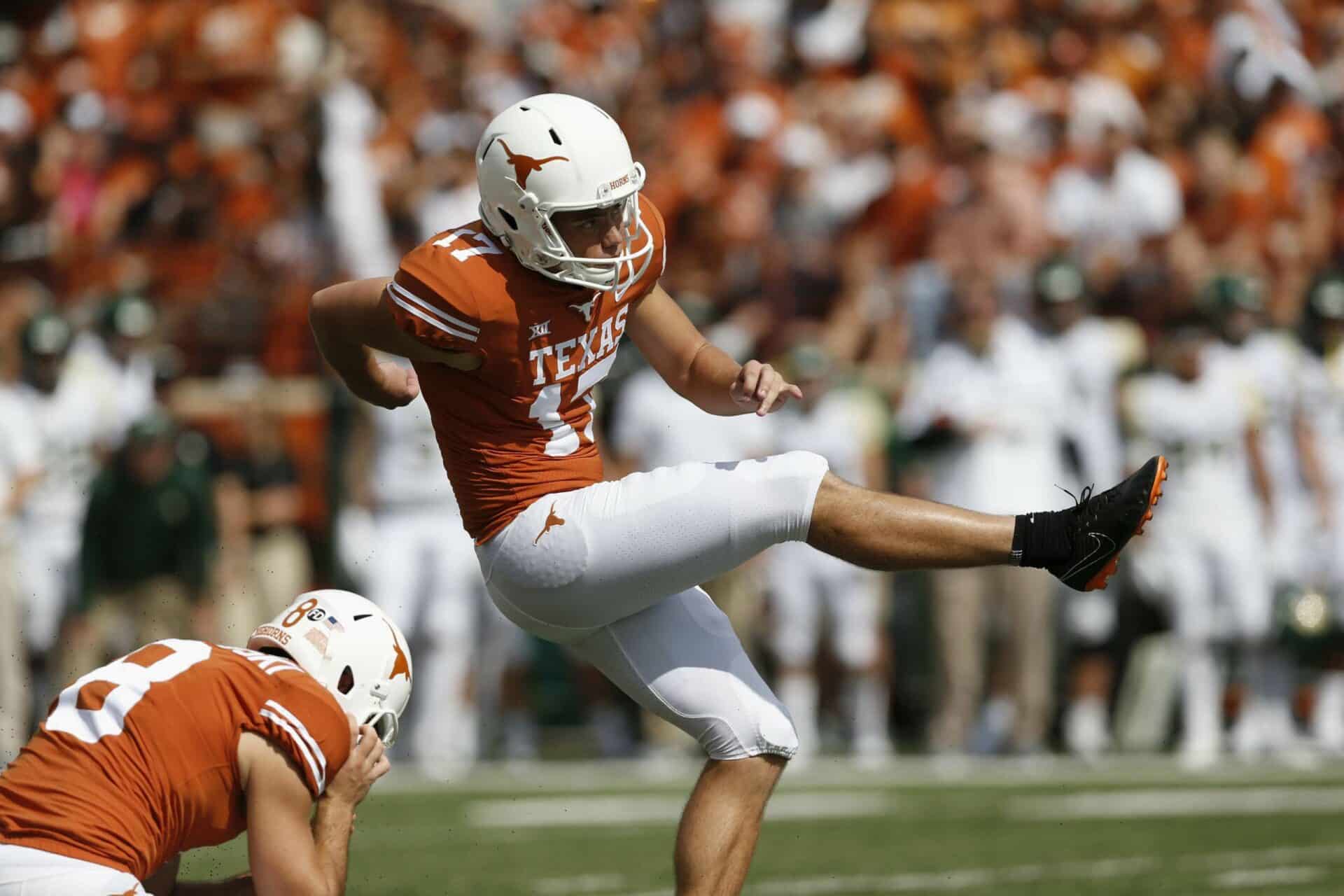 AUSTIN, TX - OCTOBER 13: Cameron Dicker #17 of the Texas Longhorns kicks a field goal in the first half against the Baylor Bears at Darrell K Royal-Texas Memorial Stadium on October 13, 2018 in Austin, Texas. (Photo by Tim Warner/Getty Images)