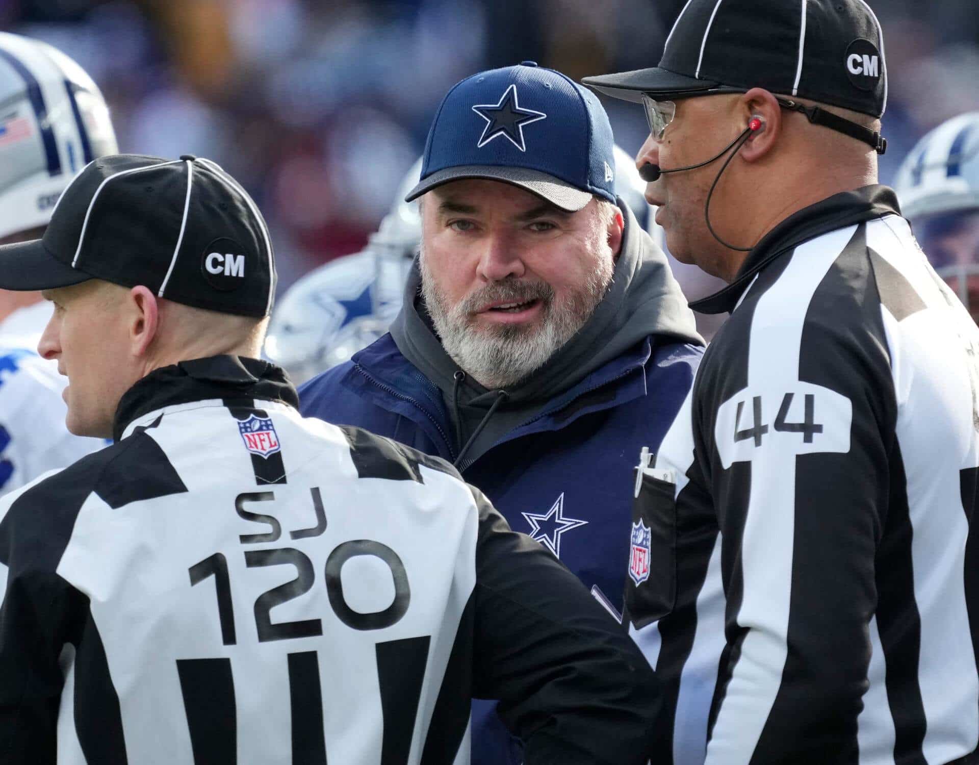 Dec 19, 2021; East Rutherford, N.J., USA; Dallas Cowboys head coach Mike McCarthy talks to referees during the first half of their game against the New York Giants at MetLife Stadium. Mandatory Credit: Robert Deutsch-USA TODAY Sports