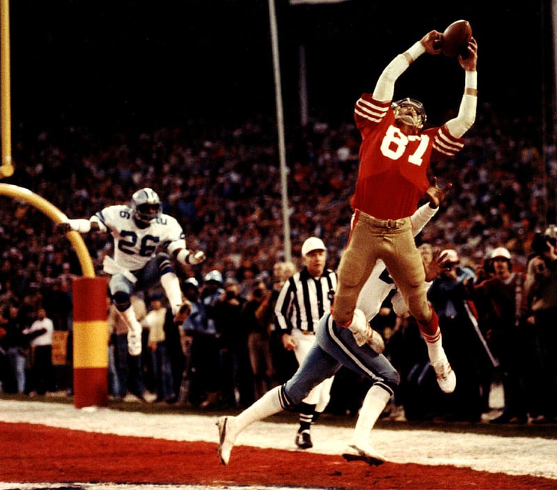 PHOTOGRAPH BY PHIL HUBER VIA KRT (1982 file photo) --THE CATCH--San Francisco 49ers receiver Dwight Clark hauls in a six-yard touchdown pass from Joe Montana with 51 seconds left in the 1982 NFC Championship game against the Dallas Cowboys. Immortalized in sports lore as 'The Catch,' Clark's reception capped an 87-yard drive that propelled the 49ers into the Super Bowl. The Cowboys play the 49ers in Sunday's NFC Championship game, the first such matchup since 'The Catch.'