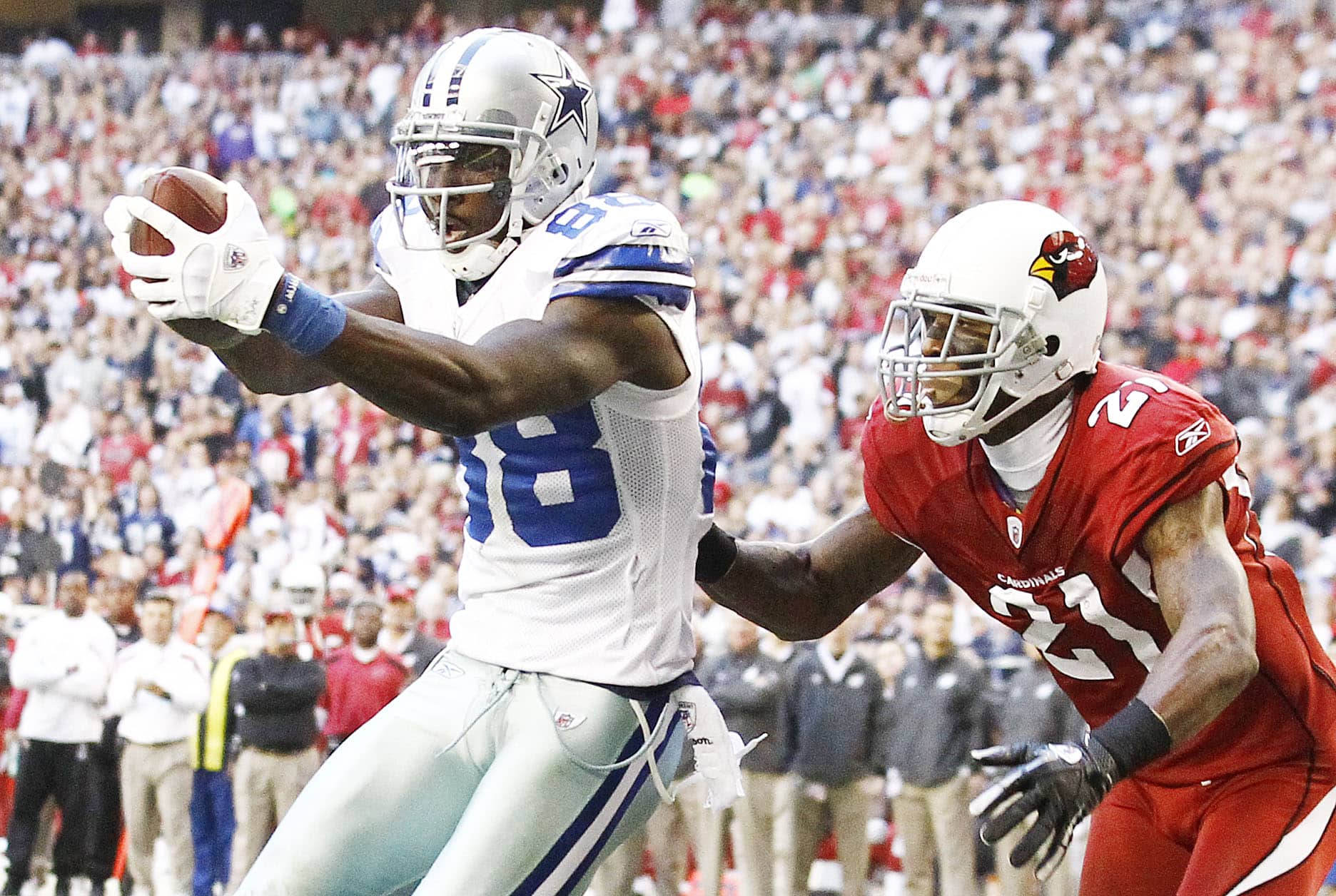 Dez Bryant hauls in a pass during a game versus the Arizona Cardinals in 2011.