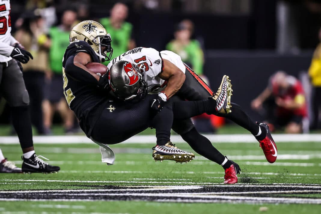 Antoine Winfield Jr. (31) can bring the lumber when tackling an opposing player.